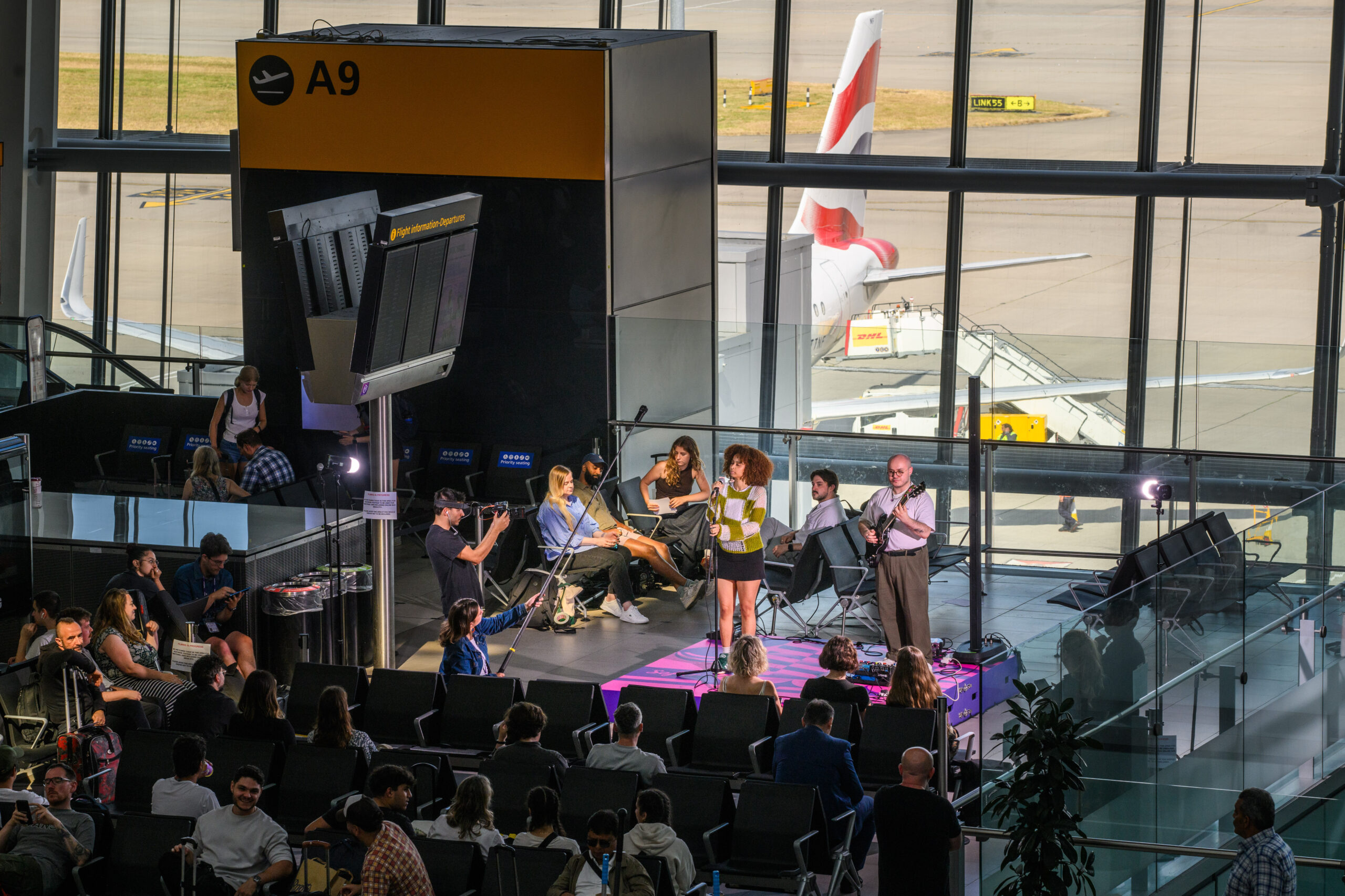 A band performs at Terminal 6 of London Heathrow, one of the Sofar Artist News features