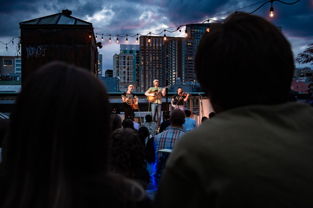 Kai Wilson performs on the Brickyard rooftop for Sofar Sounds