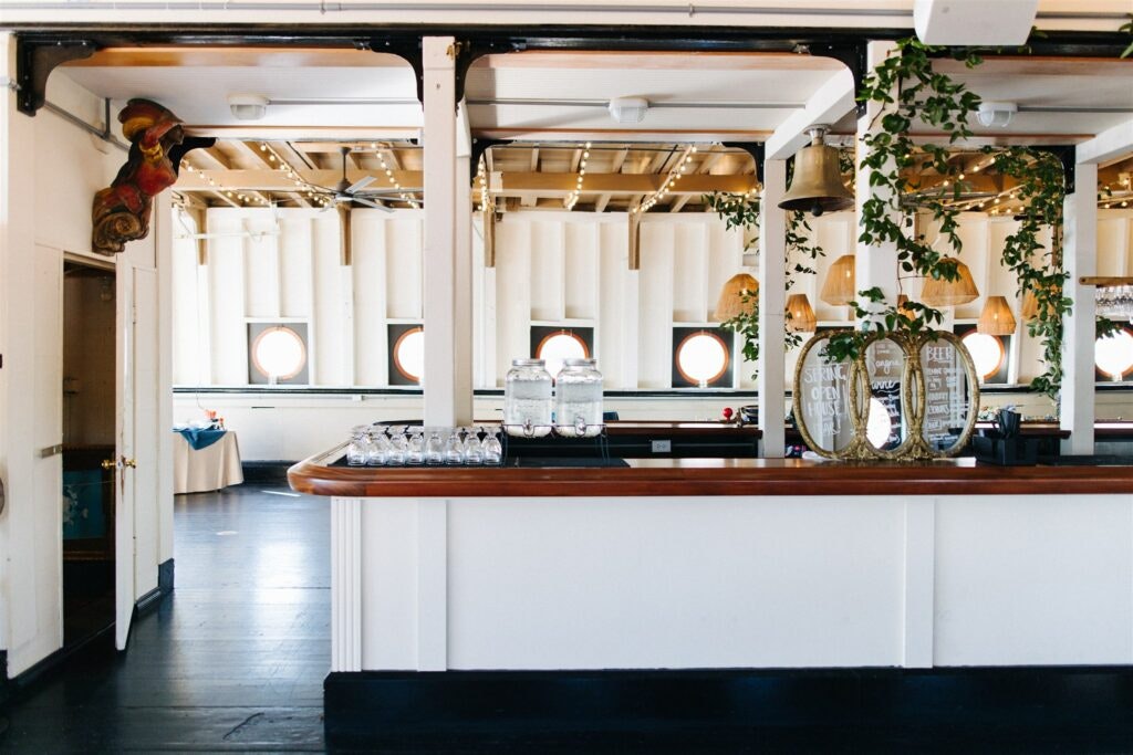 The interior of the MV Skansonia, complete with bar and rustic ceiling